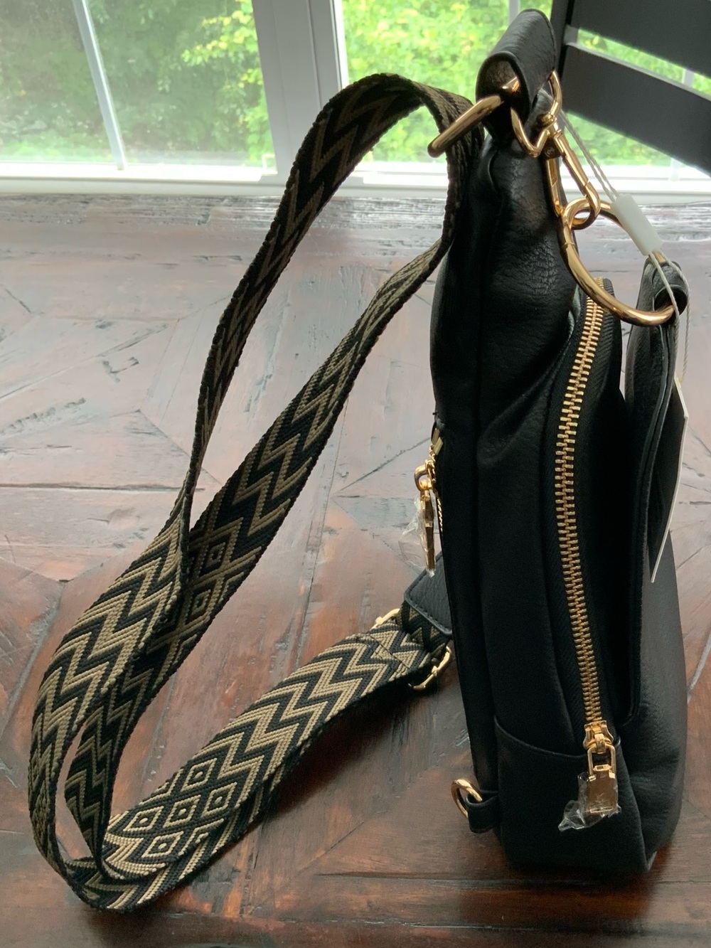 Moda Luxe Black Sling Bag with Patterned Chevron Strap - Picture 4 of 7